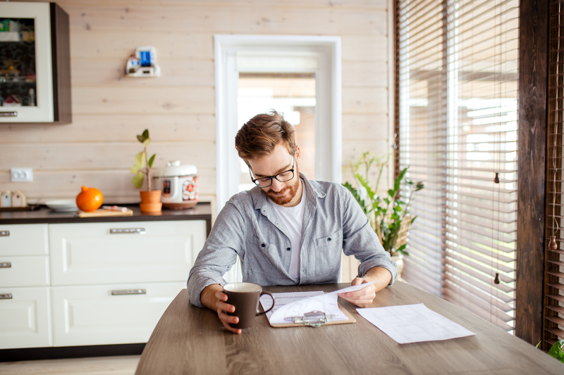 Man signing master lease for commercial real estate